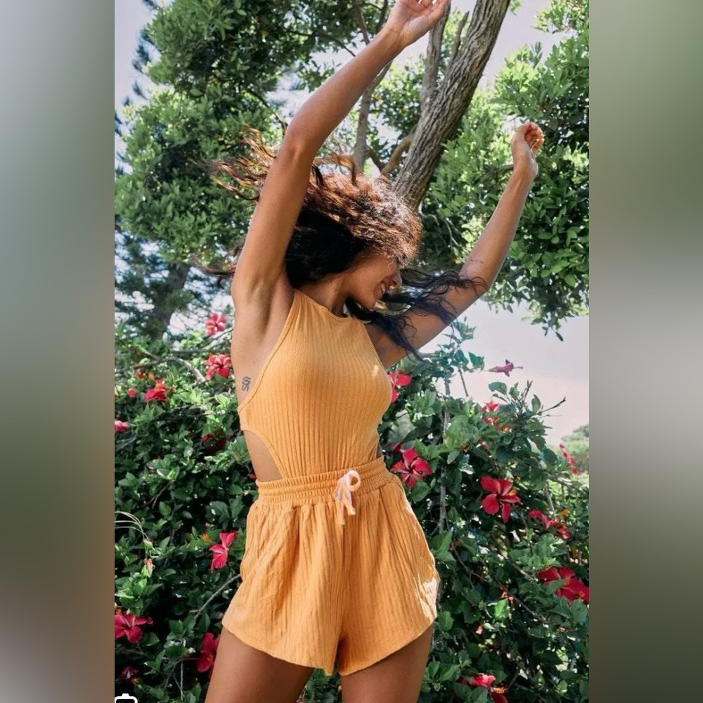 Free People Movement Blissed Out Sleeveless Open Back Romper in Orange